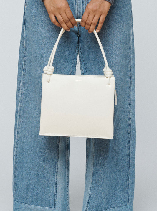 white structured square leather bag with short straps 